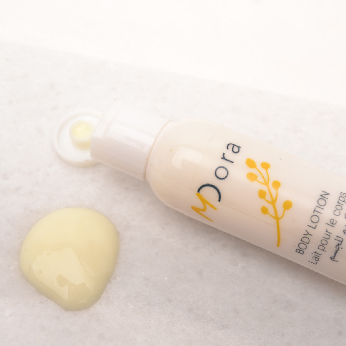 M Dora Body Lotion 30ml Bottle